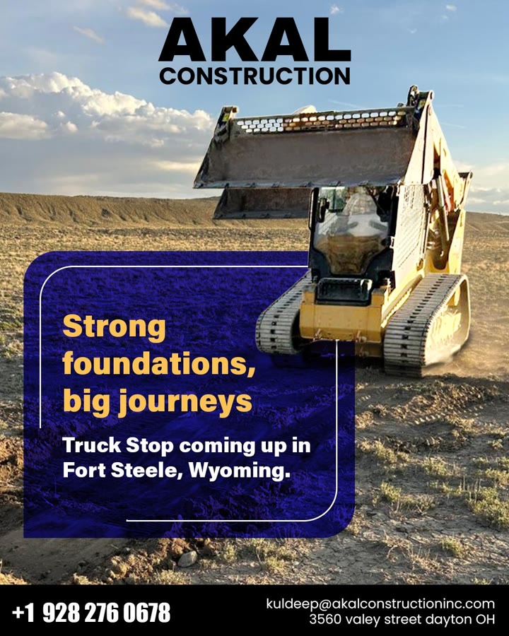 Akal Construction social post — CAT track loader with raised bucket at Fort Steele Wyoming truck stop site